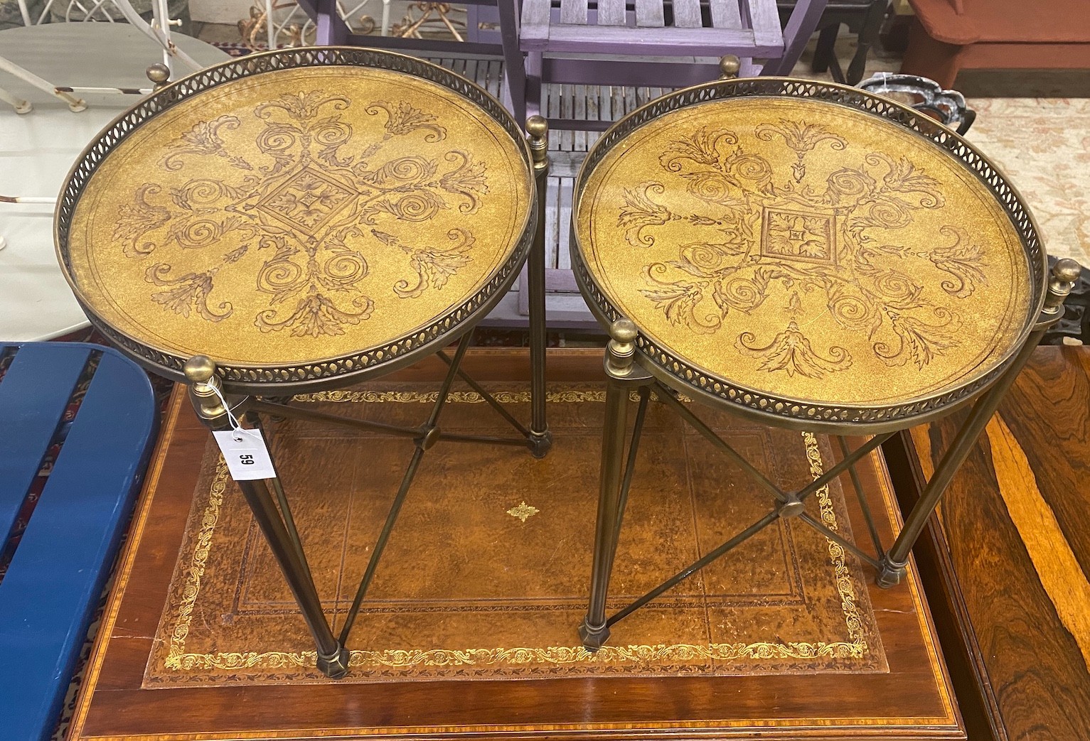 A pair of Maison Jansen style circular faux leather top brass galleried occasional tables, diameter 43cm, height 59cm